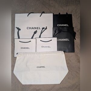 CHANEL Black and White Shopping Bags and a Dust Cover